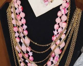 Beautiful multi-strand pink necklace with matching earrings