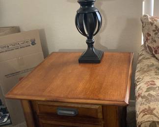 A pair of tables and lamps available 