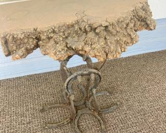 Burl table with horseshoe base