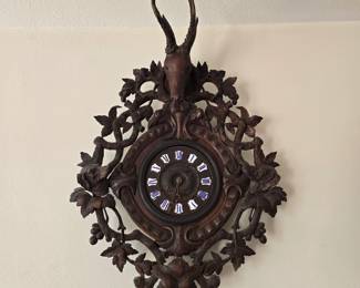 Very large black forest carved wood clock