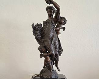 Antique bronze figural clock