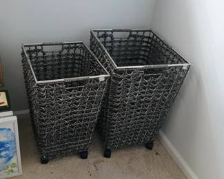 There are 3 rolling baskets total....the 3rd is in the laundry room