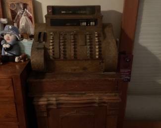 Antique cash register with table 