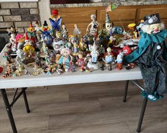 Assorted clown figurines and dolls