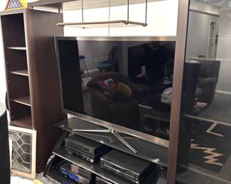 Entertainment center with shelving unit