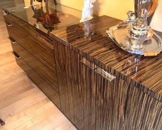 Nicole Miller Zebra Wood Sideboard/Dresser measures 36"H x 78"L x 21 1/2"D. Available for presale for $1500.
