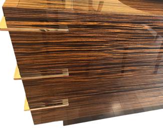 Alternate view: Nicole Miller Zebra Wood Sideboard/Dresser measures 36"H x 78"L x 21 1/2"D. Available for presale for $1500.