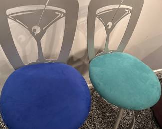 Heavy steel martini-themed bar stools