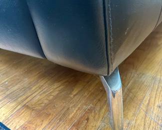 Leg detail on loveseat.