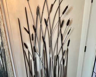 Cattail metal wall sculpture.