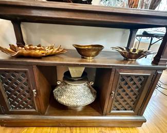 Wood cabinet on wheels.