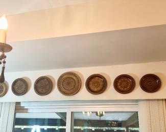 Many carved wood Polish plates throughout the home.