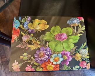 Set of 6 Mackenzie Childs black flower market cork placemats.