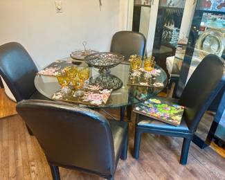 Glass top table with 4 chairs.