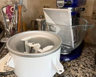 Kitchen aid with ice cream maker implement