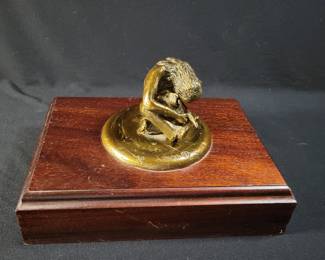 Lot # : 2 - Hand Woven Coiled Basket of Natural Fibers Handmade Coiled basket constructed with natural fibers, featuring vibrant multicolored designs. Includes a lid and two leather straps. Estimated dimensions 10.5 inches tall and 7.75 inches wide. Suitable for decorative or functional use.