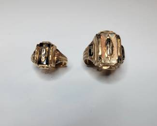 Lot # : 11 - Josten’s 10K Gold Rings Two Josten’s rings crafted in 10K gold. Includes rings from 1955 (size 9) and 1956 (size 7 1/2). Combined weight is 11.8 grams. Features detailed designs with visible hallmarks on inner bands.