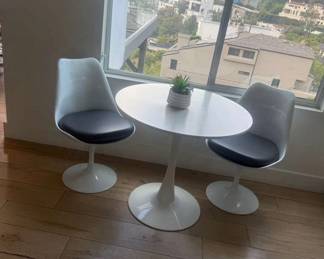 White coffee table and chairs