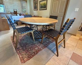 Contemporary dining table with 4 woven leather chairs