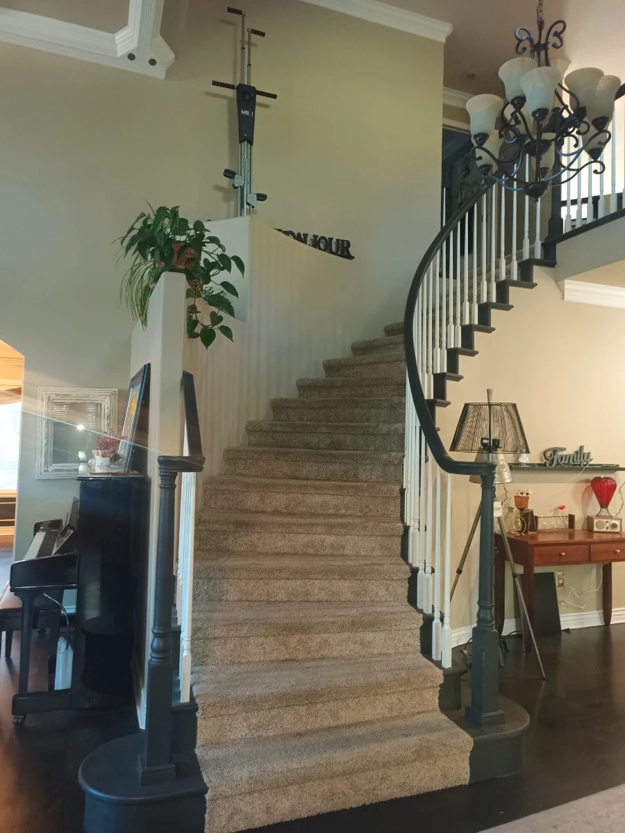 Lets get this out of the way - yes, that is a stair climber machine at the top of the stairs.