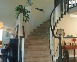 Lets get this out of the way - yes, that is a stair climber machine at the top of the stairs.