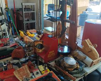 Compound bow, rifle case, crossman air pistol , gun rests