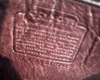 H46 - $85. Vintage 1980s/90s Coach Mahogany Leather Pocket Purse. Measures 11" wide x 2.5" deep x 8" tall. 