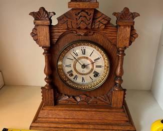 H23 - $60. 1890s Antique American Ansonia Pulford Oak Mantle Clock. Measures 11.75" x 14.75" tall. Chimes but does not work correctly. 
