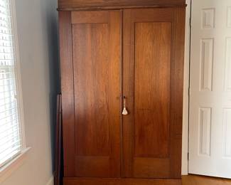 H3 - $250. Antique Wardrobe. Measures 49" wide x 17" deep x 80" tall. No bars / Shelves inside. Beautiful piece that just needs a little TLC. 