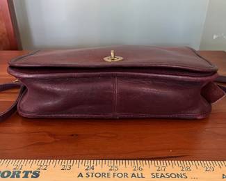 H46 - $85. Vintage 1980s/90s Coach Mahogany Leather Pocket Purse. Measures 11" wide x 2.5" deep x 8" tall. 