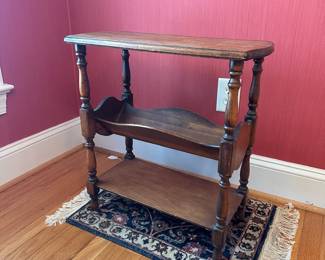 H29 - $30. Wooden Side Table. Measures 22" wide x 11" deep x 23" tall. 