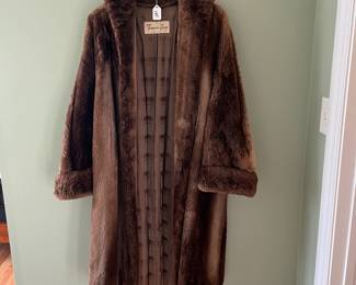 H98 - $250. Famous-Barr Fur Salon. Beaver Fur Jacket. Fits like an XL / XXL. Owner stated it is Beaver Fur. No issues noted - beautiful condition!