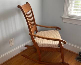 H17 - $75. Antique Wooden Rocking Chair. Overall very good condition - rocks very smoothly.  Measures 21" wide x 33" deep x 38" tall. Upholstered Cushion is in very good condition as well!