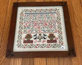 H16 - $35. 1986 Sampler. Measures 12.75" square. 