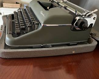 H6 - $180. Green 1950s Olympia SM3 Portable Manual Typewriter & Carrying Case. No stuck keys. 