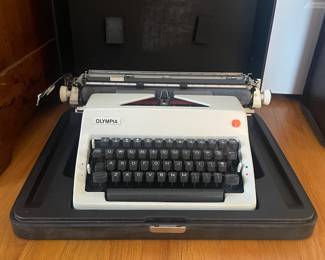 H41 - $180. Olympia 1970s SM9 Deluxe Typewriter. Wide Carriage with Case. Works. 