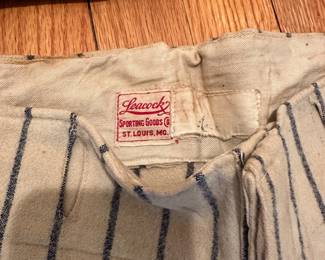 H12 - $175. Childs Wool Baseball Uniform. "White Rose Flour" was the sponsor. Some staining but no holes that I noticed. 