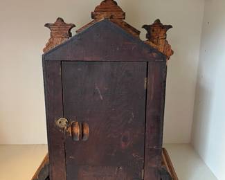 H23 - $60. 1890s Antique American Ansonia Pulford Oak Mantle Clock. Measures 11.75" x 14.75" tall. Chimes but does not work correctly. 