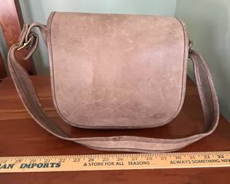 H47 - $110. 1970s Coach Tan USA Leather Messenger Flap Pouch Bag. Measures 10" wide x 4" deep x 9" tall. 