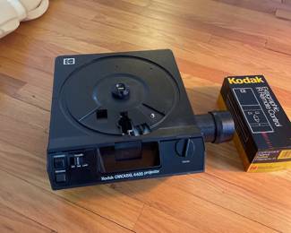 H42 - $60. Kodak Carousel 4400 Slide Projector. 2 slide trays, case & remote. Works well!