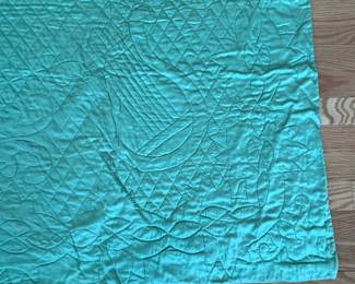 H53 - $85. Reversible Green & Purple Silk (?)  Quilted Blanket. Hand Quilted, Hand Sewn Binding. Measures 68" x 88". 