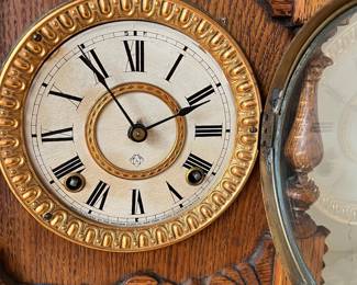 H23 - $60. 1890s Antique American Ansonia Pulford Oak Mantle Clock. Measures 11.75" x 14.75" tall. Chimes but does not work correctly. 