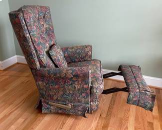 H36 - $30. Vintage Floral Recliner. Measures 32" wide x 38" deep x 39" tall. 