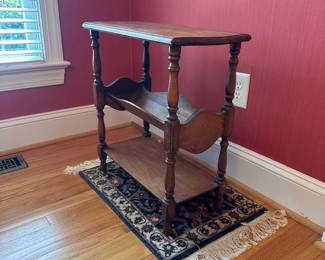 H29 - $30. Wooden Side Table. Measures 22" wide x 11" deep x 23" tall. 