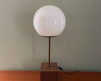 H25 - $40. Fun Vintage Table Lamp in great condition! Brass Post, Glass Globe and Wooden Base. Measures 20" tall. Globe is NOT attached. 