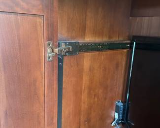 H56 - $50. Kincaid Media Cabinet. Doors slide inside for storage. Measures 48" wide x 23" deep x 62" tall. 