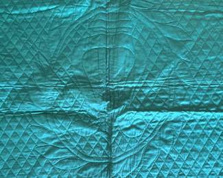 H53 - $85. Reversible Green & Purple Silk (?)  Quilted Blanket. Hand Quilted, Hand Sewn Binding. Measures 68" x 88". 