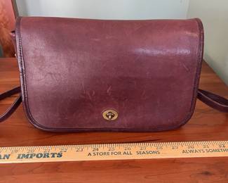 H46 - $85. Vintage 1980s/90s Coach Mahogany Leather Pocket Purse. Measures 11" wide x 2.5" deep x 8" tall. 