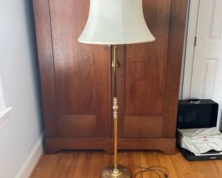 H107 - $20. Brass Floor Lamp in fair condition. Works - needs a new shade. Measures 57" tall. 