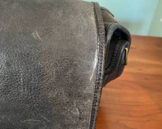 H48 - $100 Vintage 1970s Coach NYC Messenger Bag - Black Leather. Measures 10" wide x 4" deep x 9" tall. 